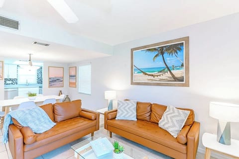 Sink into the plush leather sofa and unwind in the inviting living room