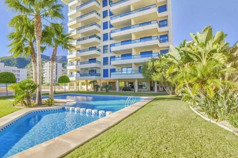 We are pleased to present you our beautiful holiday apartment with communal pool in Calpe, Costa Blanca. This apartment sleeps 4 people and has two bedrooms and two bathrooms.Inside the apartment, you will find a spacious living-dining room with TDT/SAT TV, air conditioning and access to the terrace. The kitchen is independent and fully equipped with a ceramic hob and dishwasher. The two bedrooms have a double bed each and also have air conditioning. One of the bedrooms has an en-suite bathroom with a bathtub. In addition, there is another bathroom with a shower.Outside, the apartment offers a pleasant area with a communal pool, Roman steps and outdoor shower, perfect for cooling off on hot summer days. There is also a tennis court available to guests, as well as a parking space for one vehicle.The location of the apartment is privileged, since it is close to the sea and all services. The nearest rock cove is just 750 meters away, and the restaurants and center of Calpe are 900 meters away. Furthermore, the nearest supermarket is just 350 meters from the apartment.Importantly, we offer free WiFi so you can stay connected during your stay. In addition, pets up to 12 kg are allowed with an additional fee.We hope you enjoy your stay in our beautiful holiday apartment with communal pool in Calpe. If you have any additional questions or need more information, do not hesitate to contact us.