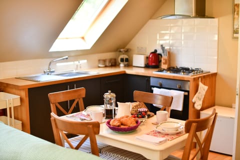 Having breakfast in Stables Cottage