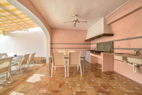 Holiday villa with private pool located in Calpe (Costa Blanca) for 12 people, with six bedrooms and four bathrooms distributed on two independent floors connected by external stairs.INTERIOR: GROUND FLOOR consists of a spacious living room, kitchen with gas hob, a bedroom with double bed, a bedroom with two single beds, a separate bathroom with bathtub and a separate bathroom with shower. The UPPER FLOOR is equipped with a fully equipped kitchen with dishwasher and gas hob, living room, four bedrooms, one with a double bed and the other three with two single beds, and two independent bathrooms with bathtub. The villa has air conditioning in all rooms.EXTERIOR: The villa has a pool with dimensions 8x4, metal stairs and outdoor shower. The pool is surrounded by artificial grass.LOCATION: Located in front of the “Salinas” of Calpe, a privileged area due to its proximity to the various services since a short distance will allow them to access the center of Calpe (2 km), the sandy beach (1 km) and the supermarket (0.5 km).OBERVATIONS: Free WiFi. Pets are allowed up to 12 kg with supplement.