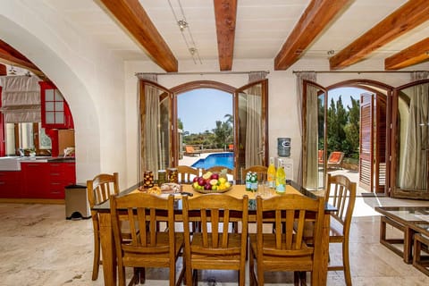 Dining area of The Almonds Holiday Home