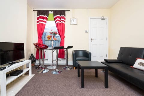 lounge with LED TV and sofa bed
