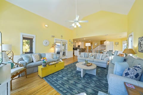 ALTERNATE VIEW OF LIVING ROOM WITH HIGH CEILINGS