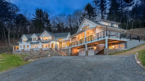 View of entire home.  Apartment stairs, patio, & covered porch on the 2nd floor.