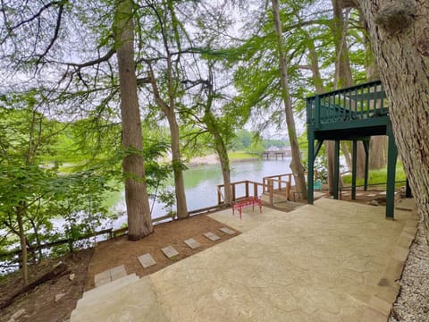 Shady hillside patios under the bald cypresses