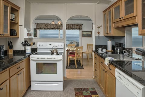 Oceanview Kitchen - Granite Counters and new fir cabinets.