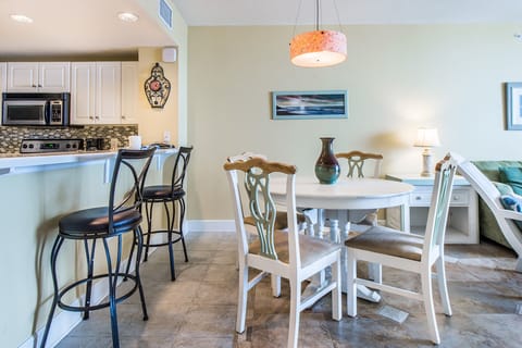 Adorable dining table seats 4, more at the bar