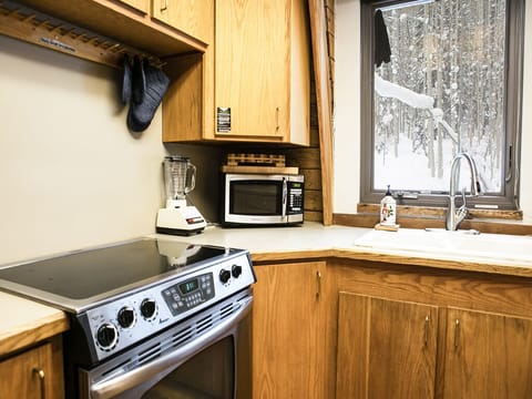 Kitchen  close up - Close up of the stove and microwave in the kitchen.