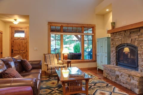 There is a gas-fired stone fireplace, large television, a selection of DVD’s, as well as cable service.