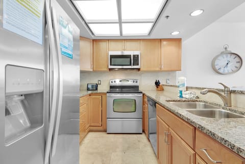 Kitchen has Granite Counter Tops