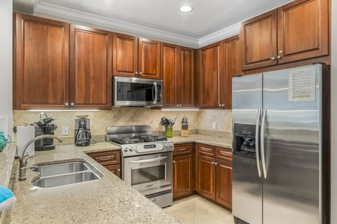 Kitchen - Spacious kitchen, with everything you need including a standard coffee maker and Keurig, crock pot, plenty of dishware - and a stand alone ICE MAKER..