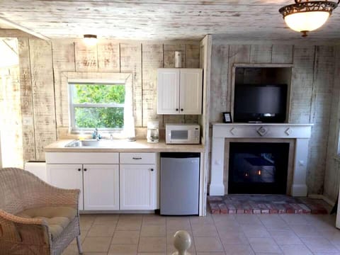Cottage - Cottage sitting area with fireplace and kitchen nook