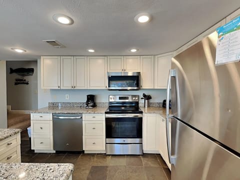 Fully Equipped Kitchen with Stainless Steel Appliances - First Floor