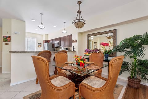 Dining Area with Glass Table and Comfortable Chairs at Waikoloa Hawai'i Vacation Rentals