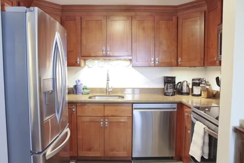 B6 Kihei Sands Beachfront Condominiums - This beautiful updated kitchen has granite counters and is fully stocked with new dishes, cookware, coffee maker, Keurig, and everything you need for food preparation.