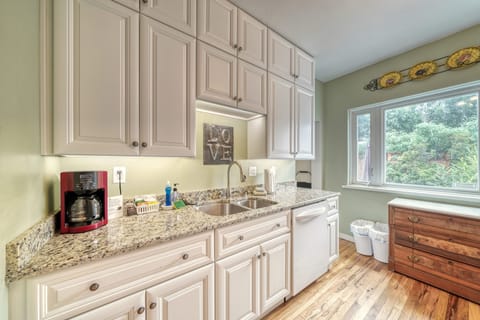 Drip coffee maker.  We provide enough coffee for your first pot.  We also provide a variety of hot tea.