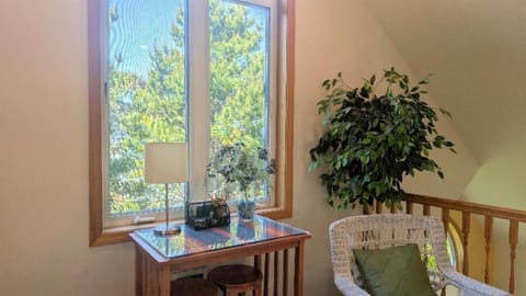 bar height table with 2 stools in loft