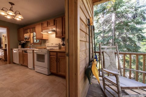 Kitchen has access to back porch