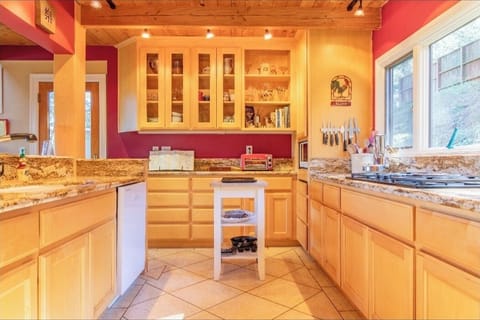 High End Kitchen with Brazilian Marble Counter Tops and Custom Made Cabinets.