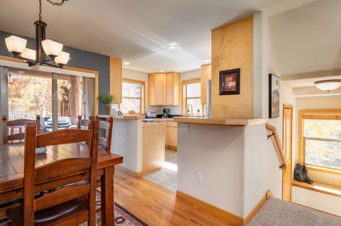 Dining Area leads downstairs and into the kicthen