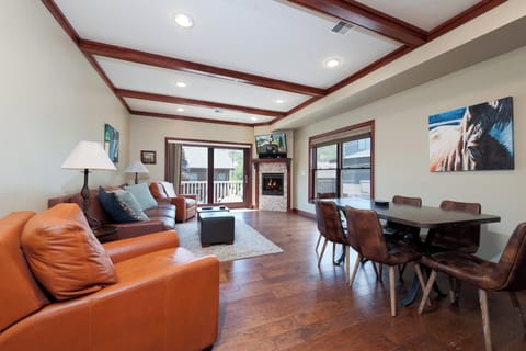 Main Living and Dining Spaces - TV, Gas fireplace and Deck