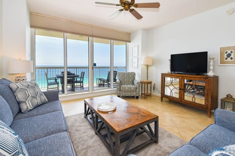 Silver Beach Towers West 1202 - Living Area with TV and Balcony