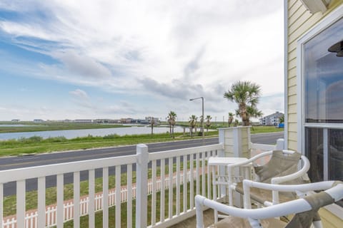 Relax on your private balcony with stunning water views, complete with comfortable seating to enjoy peaceful mornings and scenic sunsets.