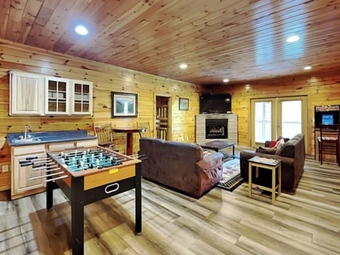 Basement Entertainment Room – Pool Table, Foosball Table, and Additional Seating