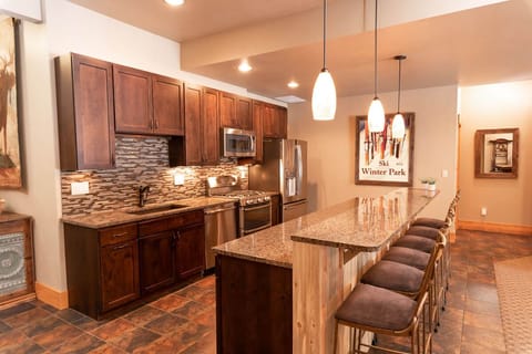 Saddle up to the bar & full kitchen on the lower level