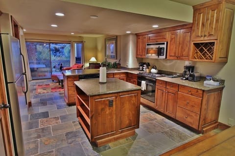 Kitchen with stainless steel appliances and granite counter tops in Park City Racquet Club Village - Park City