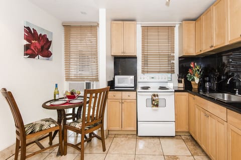 Immaculate Kitchen by Dining Area with Window AC
