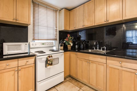 Immaculate Kitchen with Granite Counter Tops