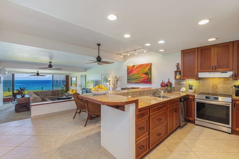 Full kitchen, open area dining, living room, and spectacular view!