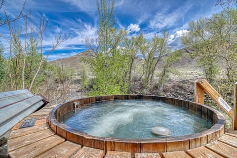 Soak and relax in the hot tub right on the banks of the Arkansas River!