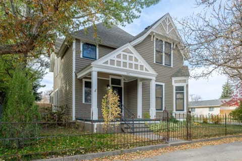 Restored Victorian style home with a fully fenced yard.