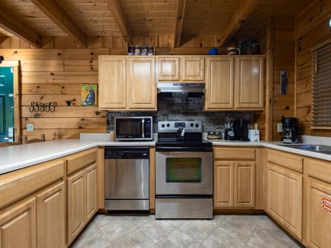 Fully Equipped Kitchen with Stainless Steel Appliances