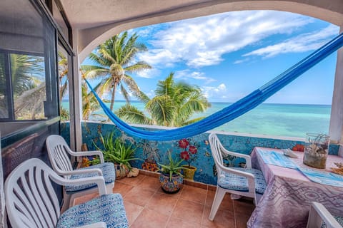 Balcony with a Hammock and Outdoor Dining