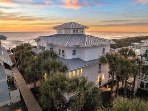 Stunning beachfront property with panoramic ocean views and tropical landscaping, perfectly positioned for coastal relaxation.