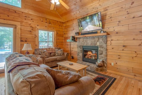 Lounging In The Living Area - Bask in the comforts of this lovely living area. Whether you are looking to lounge with your favorite book, or watch your favorite show, A Mountain Paradise has it all. 