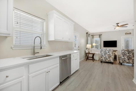 Kitchen - The kitchen has been updated with all new cabinetry, countertops, stainless appliances, and is fully stocked for meal prepping during your stay.