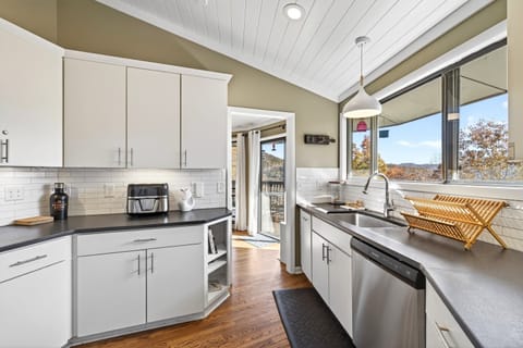 Kitchen with a dishwasher & Drip-style coffeemaker.