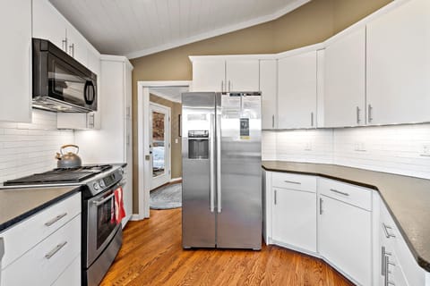 Kitchen with a dishwasher & Drip-style coffeemaker. (Ice dispenser does not work.)