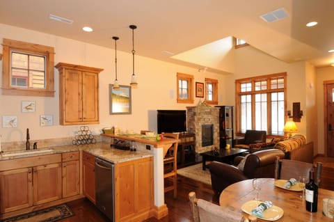 The living area with the dining, kitchen, and living room.