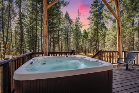 Roger Dodger ~ covered hot tub on the deck with a beautiful and peaceful view