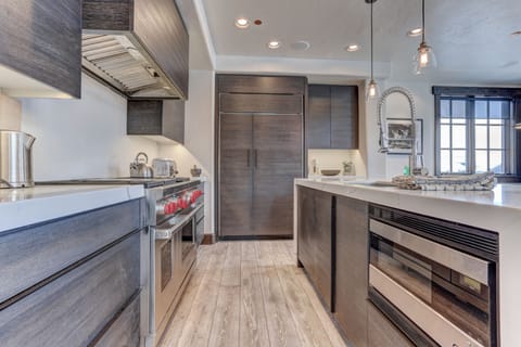 Modern Kitchen with Marble Counter Tops, Wolf Appliances and Sonos Sound