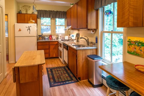 Prepare meals in the well-appointed kitchen, featuring modern appliances.