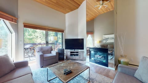 Gather around the gas fireplace in this inviting and open-concept living room.