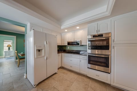 Step into a kitchen alive with possibility—where gleaming appliances invite you to craft everything from sunrise smoothies to indulgent dinners.