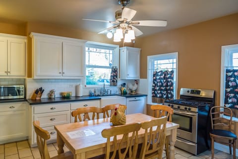 Kitchen - Free standing gas stove and oven with solid surface countertops