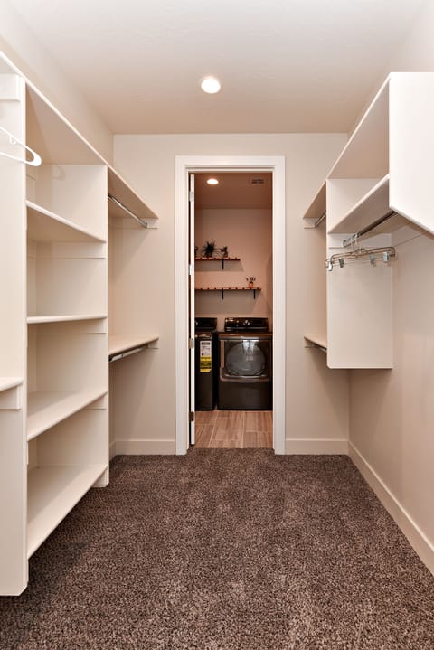 Master Closet - This master closet provides plenty of space for all of your luggage!